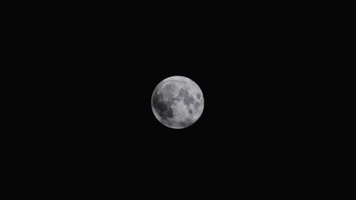 Dramatic Full Moon in the Dark Night Sky