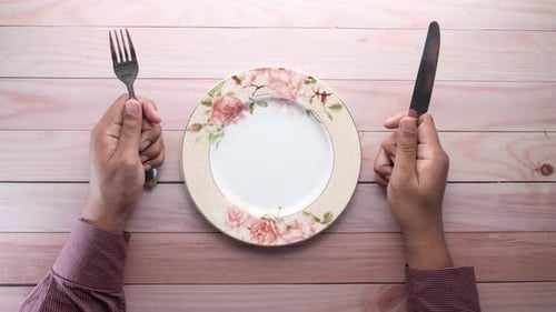 Waiting to Eat: Plate, Fork and Knife