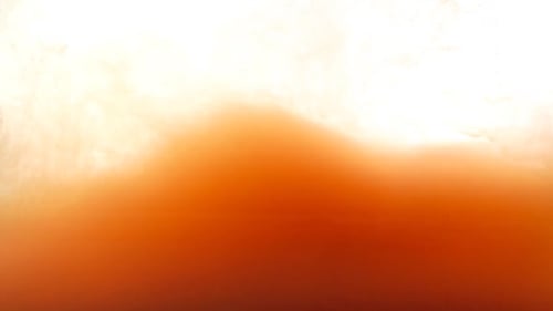 Abstract Orange and White Ink in Water