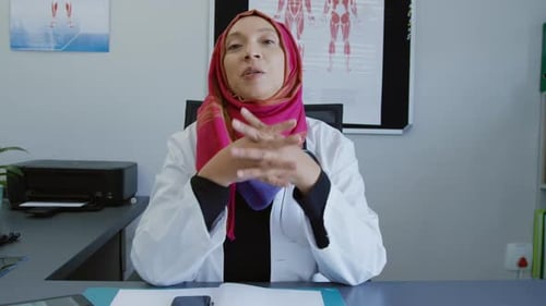 Doctor Explaining Healthcare at Office Desk