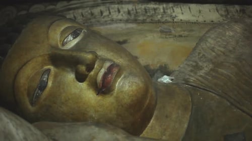 DAMBULLA, SRI LANKA - FEBRUARY 2014: The view of a sleeping Buddha at the Golden Temple of Dambulla.