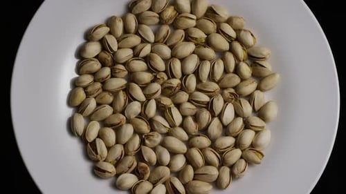 Plate of Pistachios Zooming In