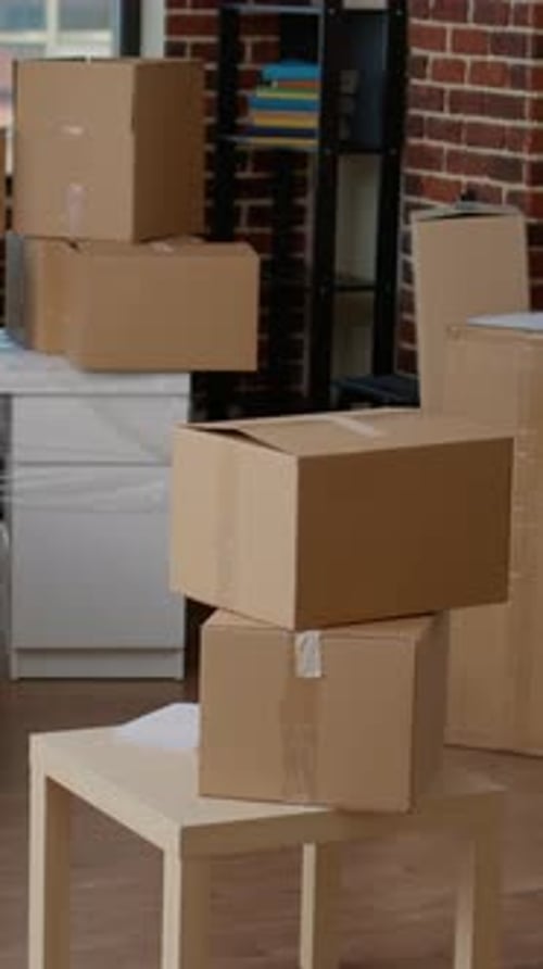 Cardboard Boxes Stacked in an Apartment