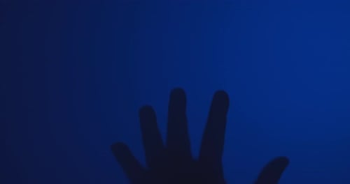 Reaching Hand on Gradient Blue Background