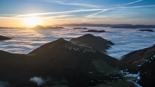 Sunrise over Mountains with Sea of Clouds