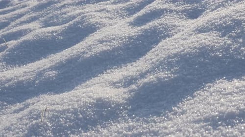 Tilting on frozen crystalline water dunes over the hill 4K 2160p 30fps UltraHD footage - White crys