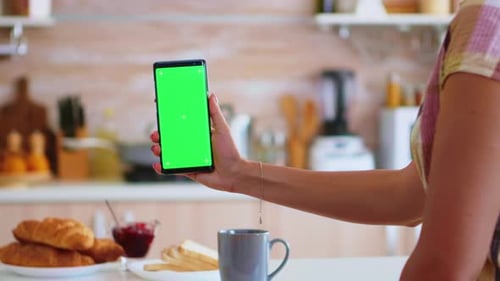 Wife Using Phone with Green Screen