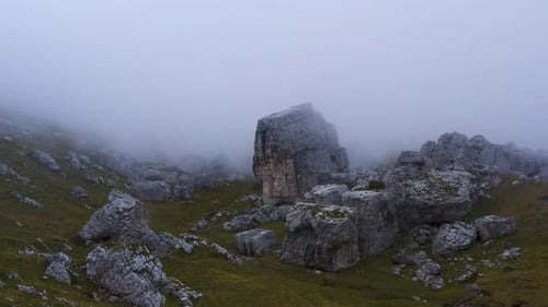Misty Mountain Landscape with Rocky Boulders