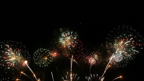 Spectacular Fireworks Display Exploding in Night Sky