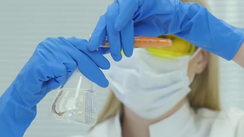 Medical Professional Doing Science Experiment in Lab