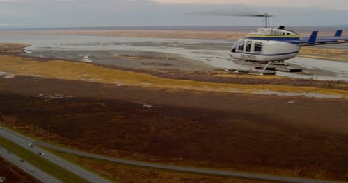 Scenic Aerial View with Rural Road and Helicopter
