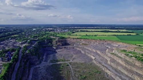 Opencast Granite Mining Quarry with Working Machinery