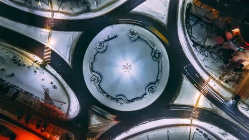 Aerial View Night Timelapse of Roundabout Road with Circular Cars in Small European City Steady Shot