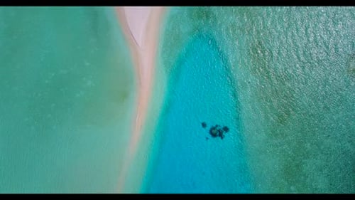 Aerial nature of tropical bay beach time by aqua blue ocean and white sandy background of a dayout a