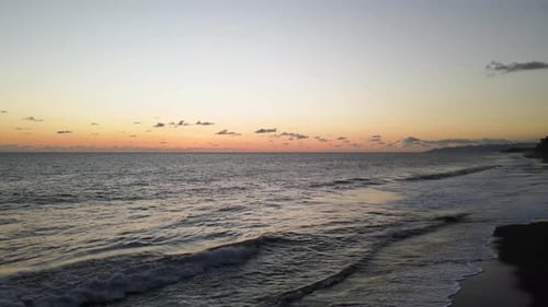 Slow aerial shot of the sunset at the beach in Osa Peninsula, Costa Rica