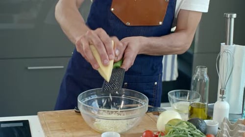 Cooking Show Presenter Grating Cheese