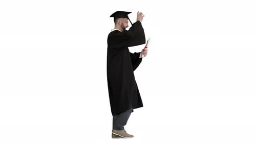 Smiling Graduate Holds Up Diploma Walking