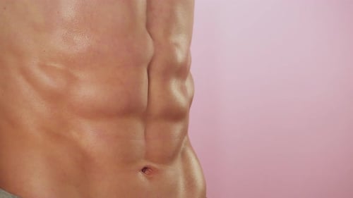 Close Up of Shirtless Man's Muscular Abdomen