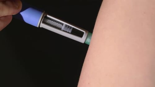 Medicine Injection in Arm Close Up