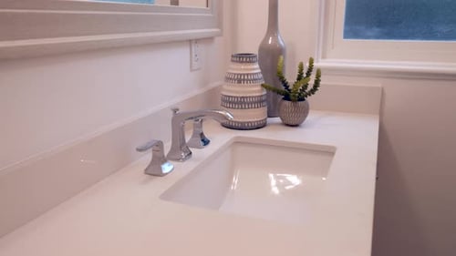 Clean White Bathroom Sink With Modern Accents