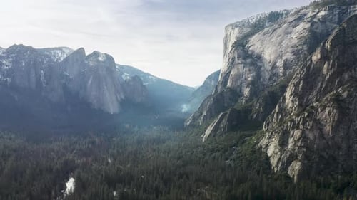 View of the Green Valley Meadow Surrounded By the High Peaks of Granite Cliffs