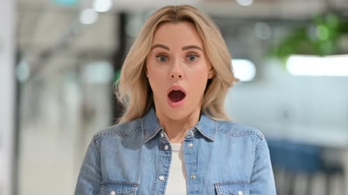 Woman Reacts with Shock and Surprise