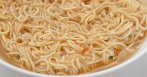 Close Up of Delicious Instant Noodles and Broth