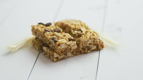 Stacked Granola Bars with Peanuts and Chocolate Pieces