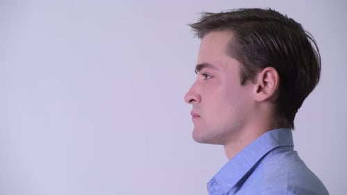Profile View of Young Handsome Businessman Thinking