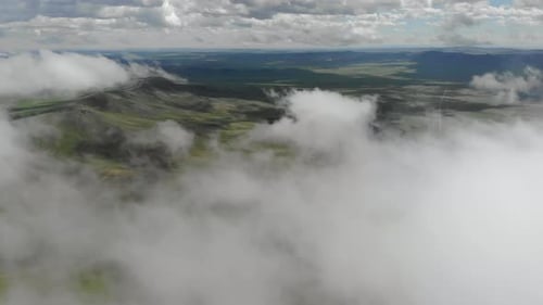 Aerial View of Mountains and Clouds