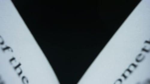 Turning Pages of a Book in Close Up