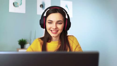 Smiling Woman on Video Call at Home