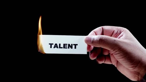 Talent Card Burning in Dark Setting