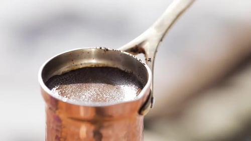 Copper Cezve for Coffee in Winter Mountains
