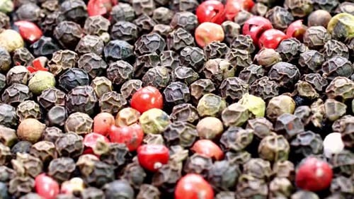 Close Up of Mixed Black, Red and Green Peppercorns