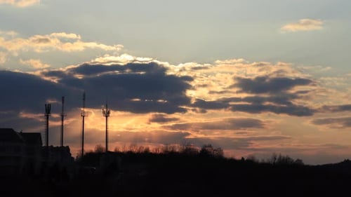 Beautiful time lapse sun set on colourful clouds background