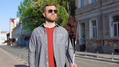 Portrait of a Blind Man with a Cane in the Old City