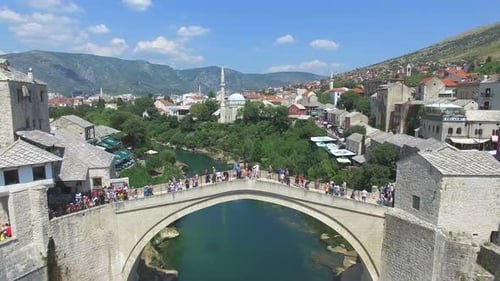 Flying above Mostar bridge over river Neretva