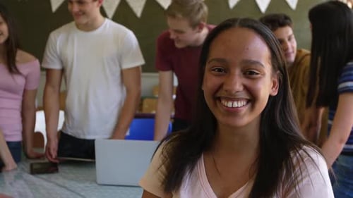 Portrait of teenage girl in a school classroom