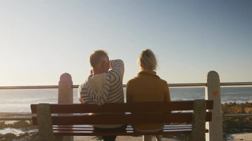 Senior couple embracing each other at beach