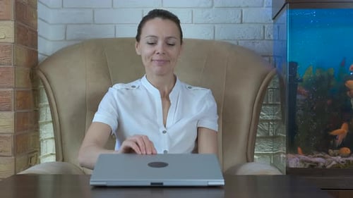 Relaxed Woman Meditating after Using Laptop