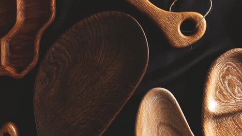 Wooden Plates on a Black Background, Still Life