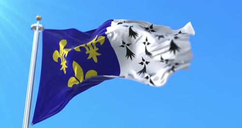 Flag of Brittany Waving Dynamically Against a Clear Blue Sky