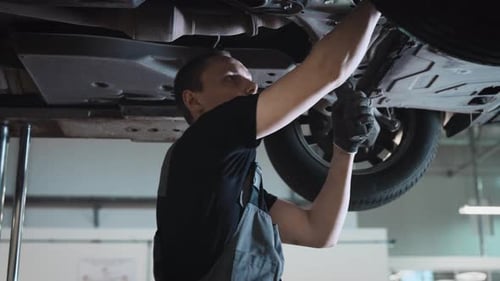 Car on a Lift in a Specialized Service