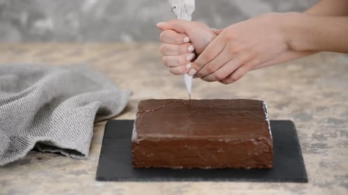 Decorating Chocolate Cake With Drizzled Chocolate Frosting
