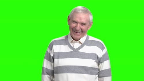 Senior Man Laughing Hysterically on Green Screen
