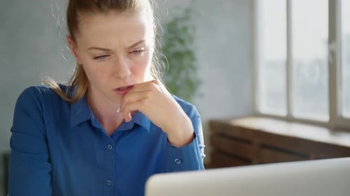 Business, Office, School and Education Concept - Stressed Businesswoman with Computer at Work