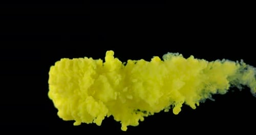 Vibrant Yellow Ink Explosion on Black Background