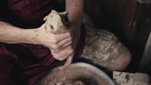 Serious Woman Working at Pottery Wheel in Studio Prepare Clay to Make Plate to Restaurant