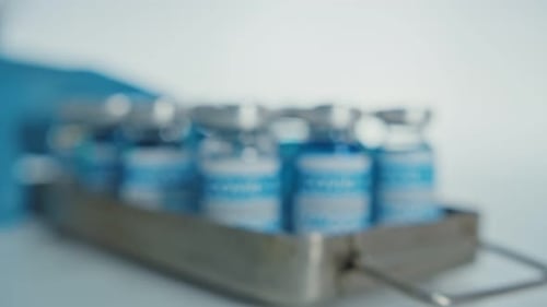 COVID-19 Vaccine Vials in Metal Container